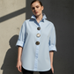 👚 Oversized damskjorta med statementknappar