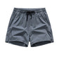 Snabbtorkande sportshorts för män med fickor
