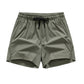 Snabbtorkande sportshorts för män med fickor