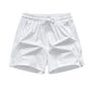 Snabbtorkande sportshorts för män med fickor