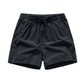 Snabbtorkande sportshorts för män med fickor
