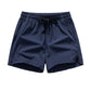 Snabbtorkande sportshorts för män med fickor